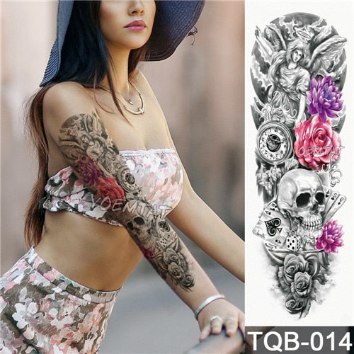 Feminine Rose Tattoo on Arm